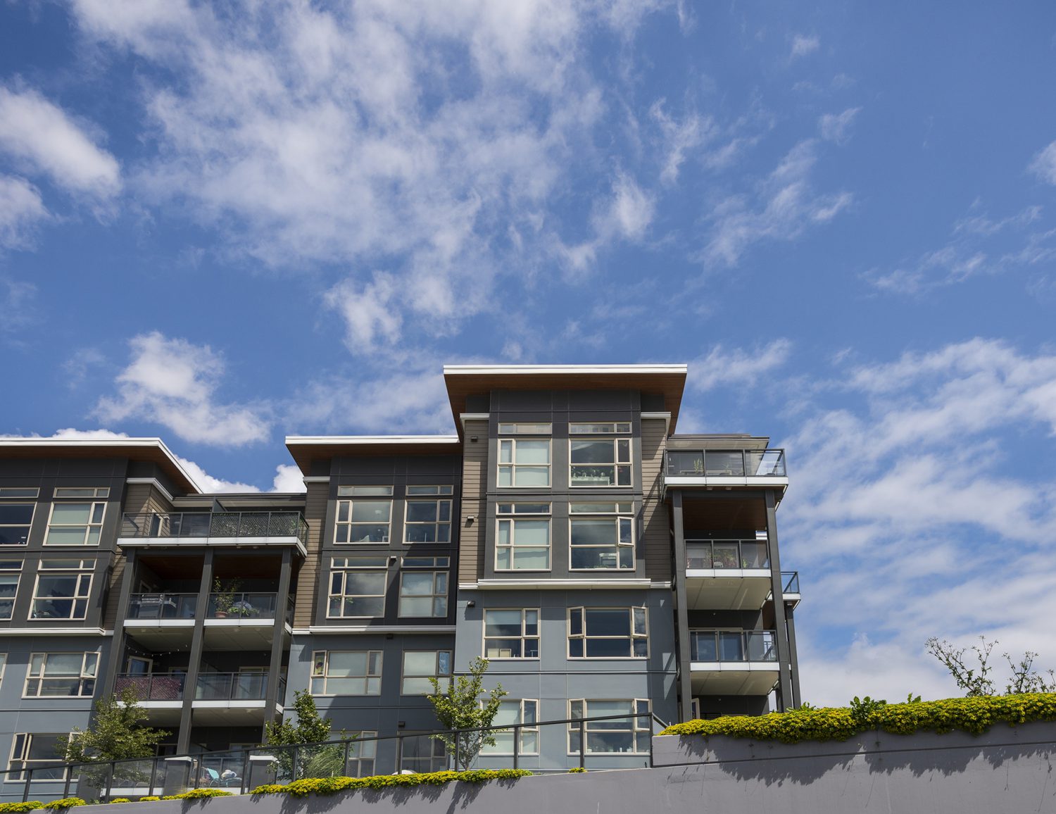 Bottom-up view of the Residences at Fremont Village in Port Coquitlam.