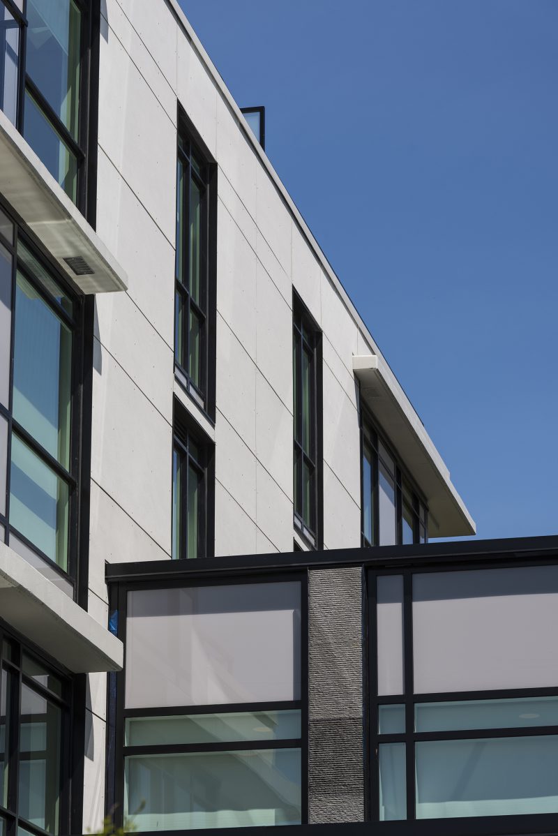 Close-up of top of the Opal retirement building in Vancouver