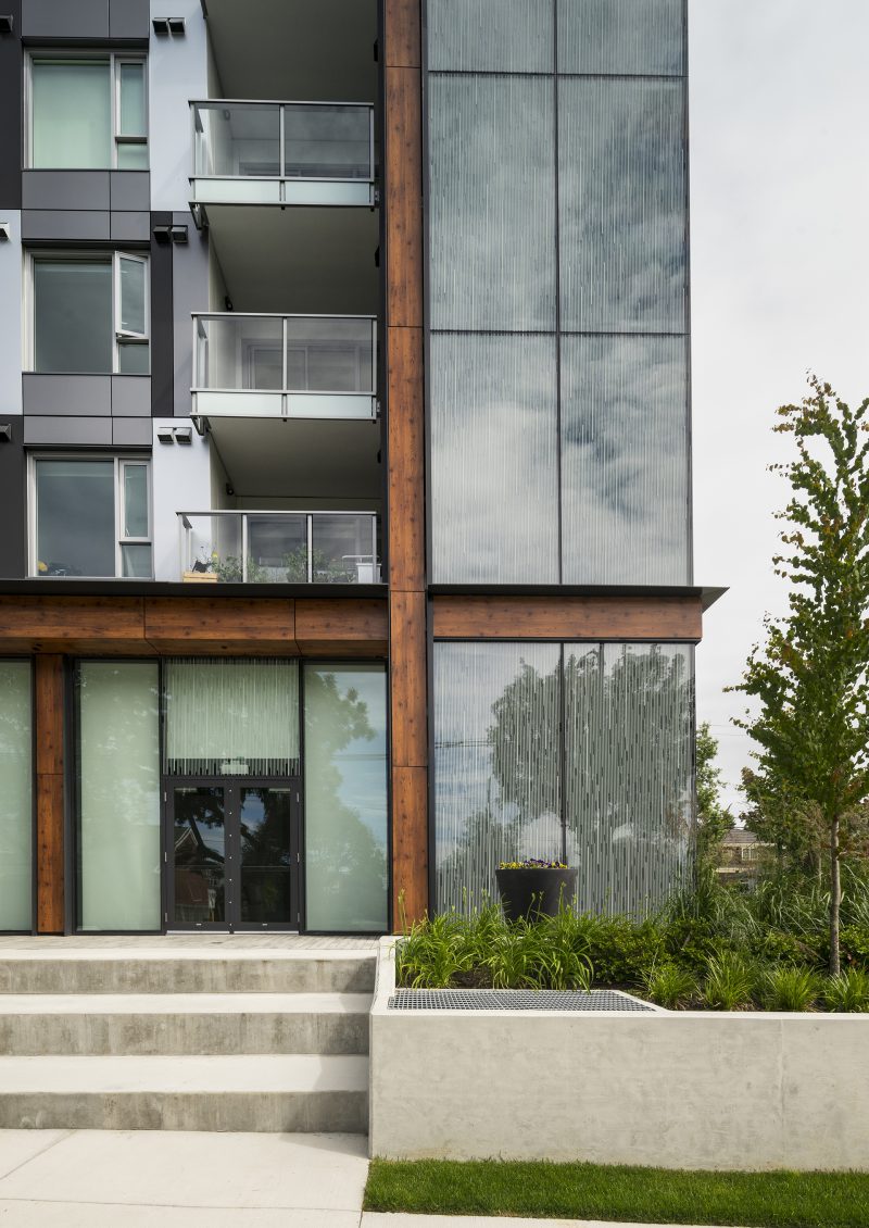 Front entrance to the midrise condo building, Parker