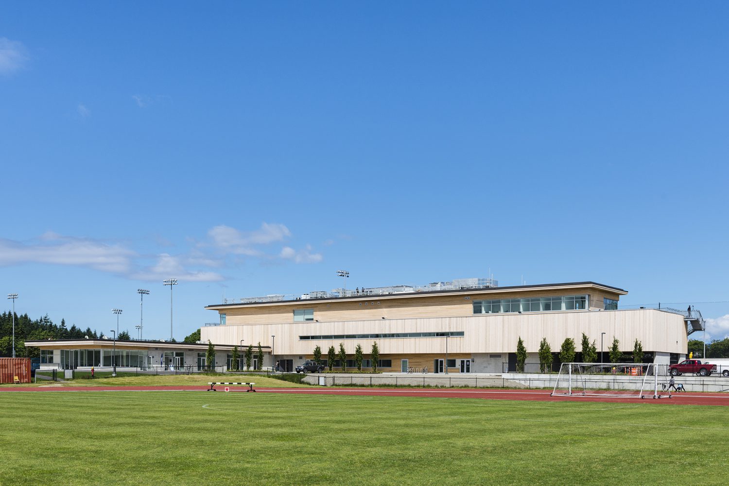 Whitecaps Training Centre siding and premium cladding in wood grain panels